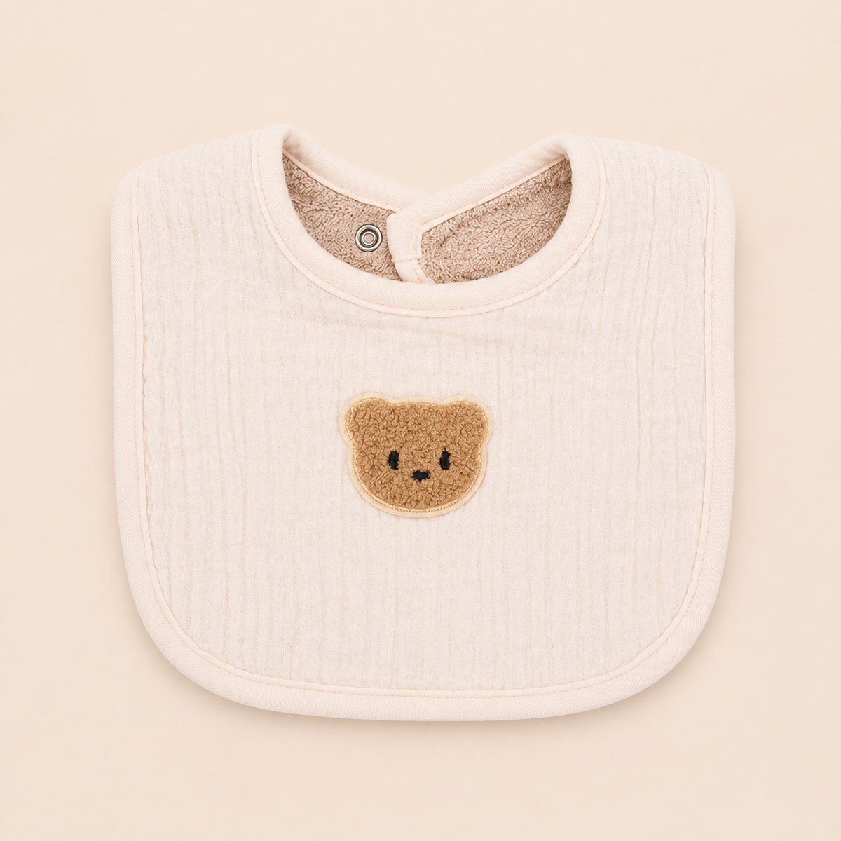 Bavoir en mousseline de coton, motif ours