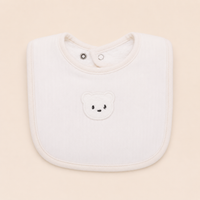 Bavoir en mousseline de coton, motif ours